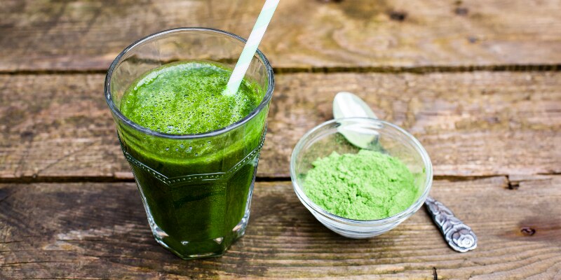 wheatgrass in a glass green supplements powder