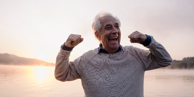 man flexing muscle health